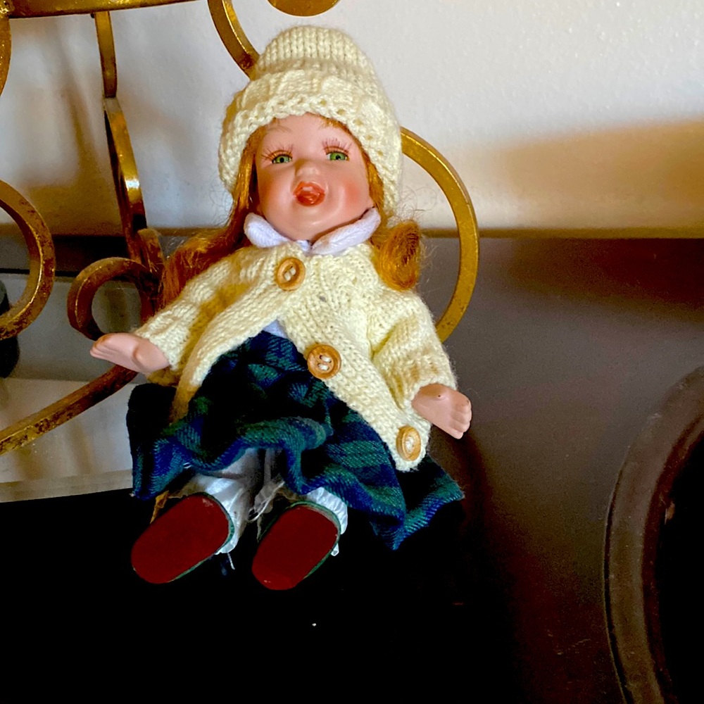 Porcelain doll. Offers accepted